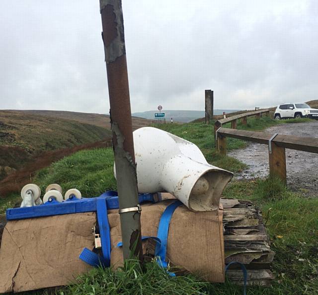 ASBESTOS corrugated roofing tied to a trolley and dumped along with a toilet