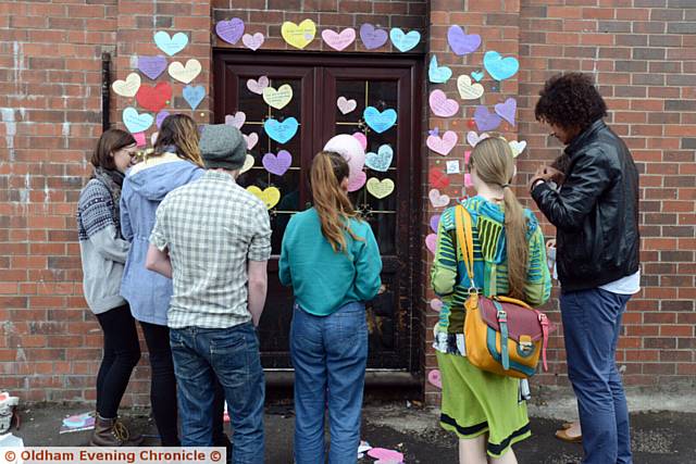 YOUNG people from Manchester 'love bomb' the Jamia Qasmia Zahida Islamic Centre
