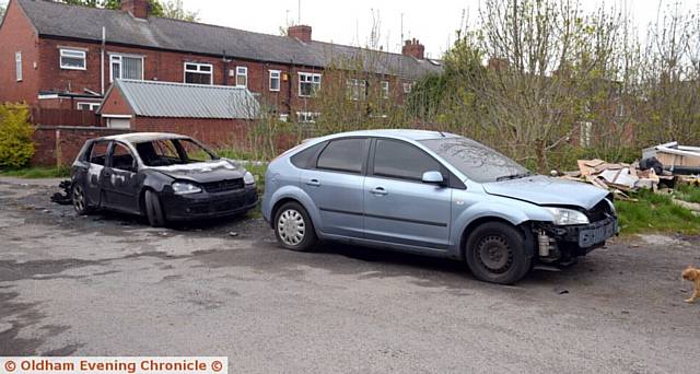 THE fire-damaged cars in Wilson Street, Werneth