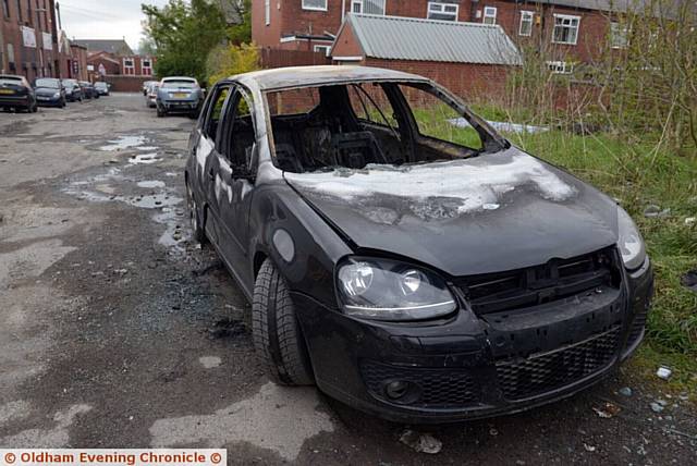 THE fire-damaged cars in Wilson Street, Werneth