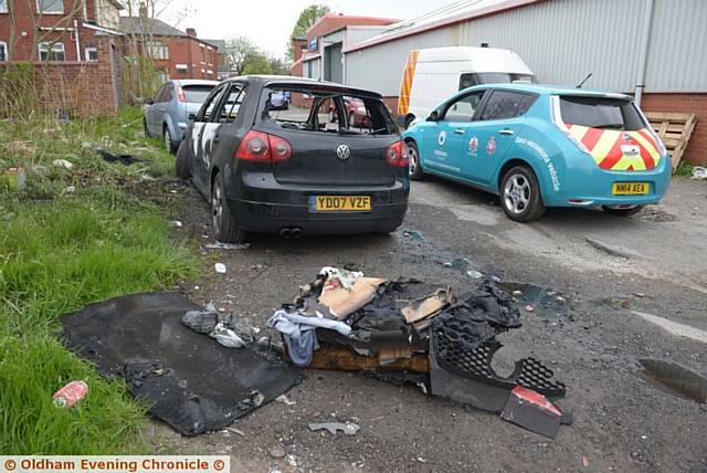 THE fire-damaged cars in Wilson Street, Werneth