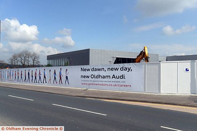 GEARING up . . . the new Audi showroom being constructed on Chadderton Way