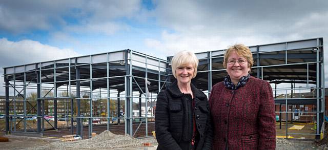 TAKING shape . . . the new depot with Cath Green First Choice CEO and council leader Jean Stretton