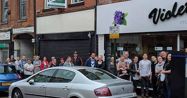 BUSY . . . A queue forms at Violet Studios, on Yorkshire Street 