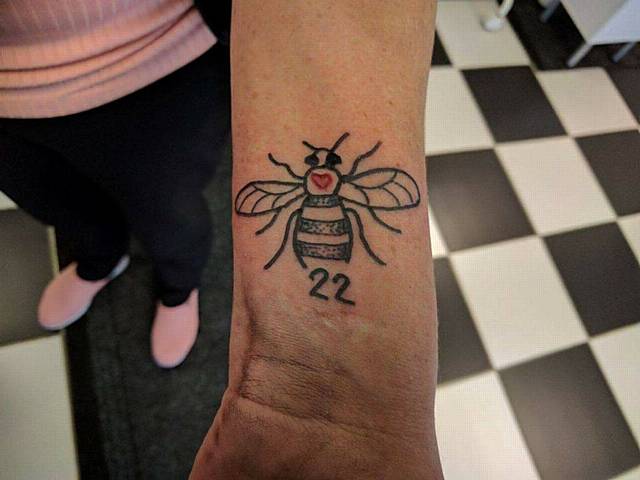 Manchester Bee tattoo.