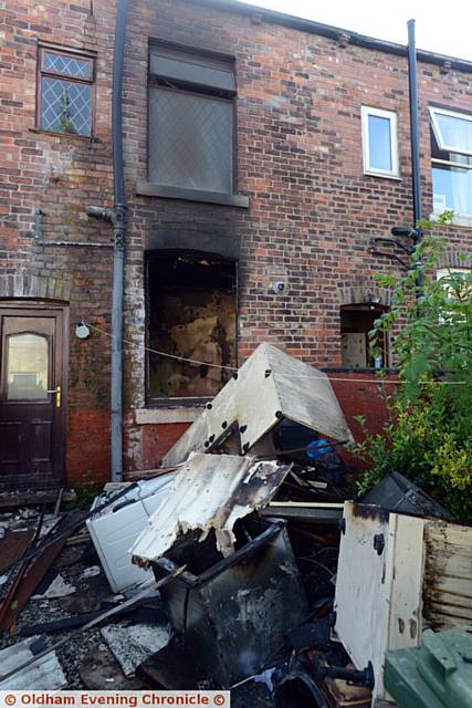 House fire in Denbigh Street, Mossley. One resident was rescued.