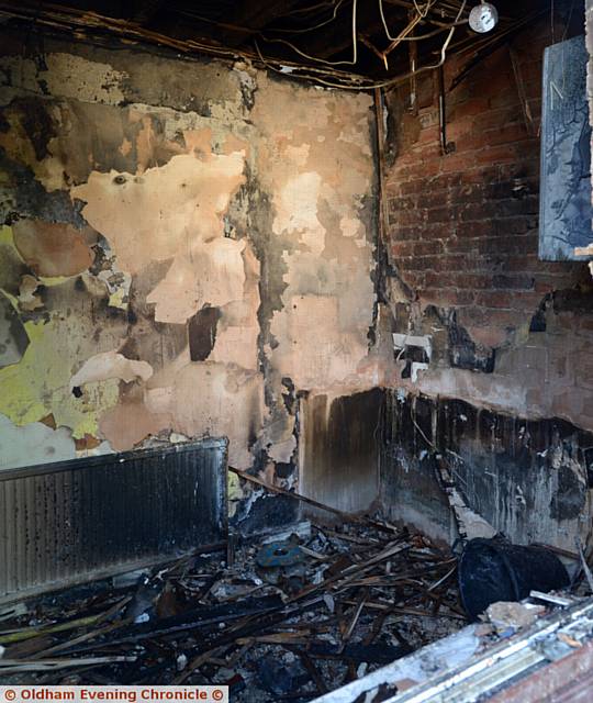 THE wrecked kitchen in the fire-ravaged house                         