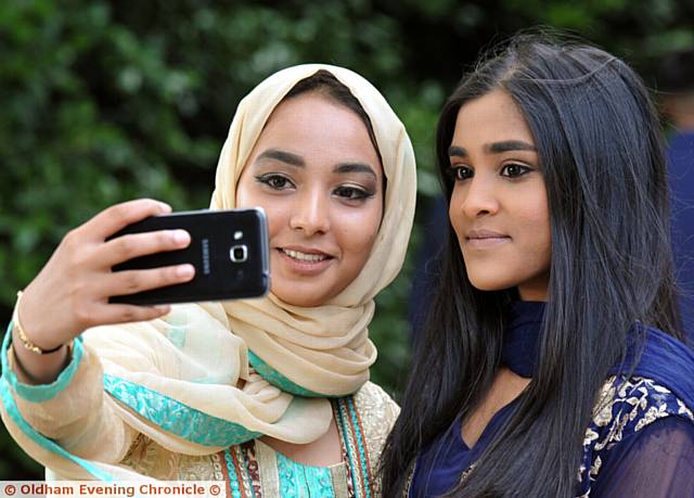 SELFIE . . . Nafla Akram (left) and Rahima Begum