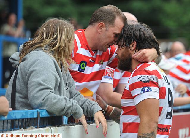 HOLD YOUR HEAD UP: Oldham's Sam Gee talks to fans at the end of the game