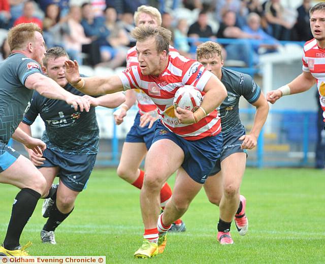 STAR MAN: Oldham winger Adam Clay, his side's best performer on a poor day, gets into his stride. 