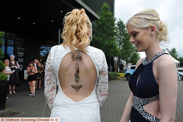 Hathershaw College prom at the Village Hotel, Ashton-u-Lyne. Emily McGuinn admires Leah Astley's back.