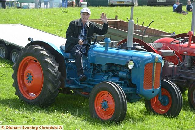 Saddleworth Show at Well-I-Hole Farm, Greenfield. Pictured here is tractor lover Harold Tonge with his 1959 Ford Dexta