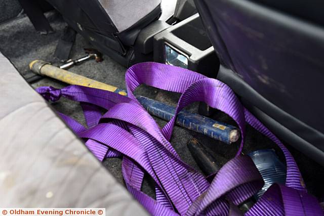 Asif Lohdi had his car stolen. When it was recovered he found tools/ weapons strewn around the vehicle.  Police still haven't been out to see it. PIC shows hammer and pick axe handle.
