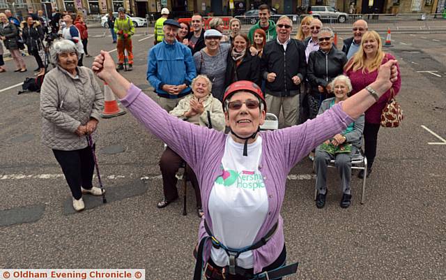 HAPPY landings . . . Patricia celebrates as she reaches the ground