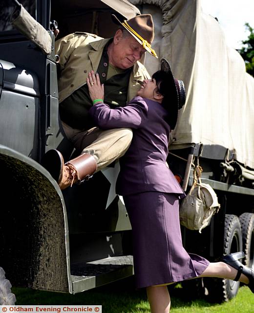 GIVE us a kiss . . . Phil Brady with his sweetheart Sarah Brady