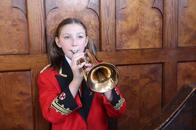 Dobcross Youth Band led the village procession. Scarlet Brooke (12) was the soloist for the Last Post and Reveille