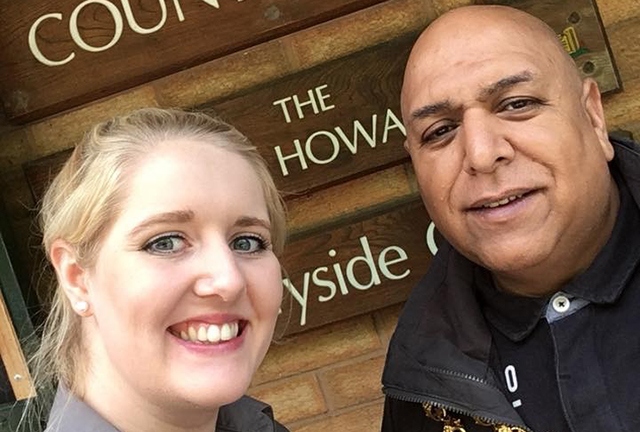 Amy Meadows, from Daisy Nook, pictured with the Mayor of Oldham, Councillor Javid Iqbal, outside the refurbished cafe