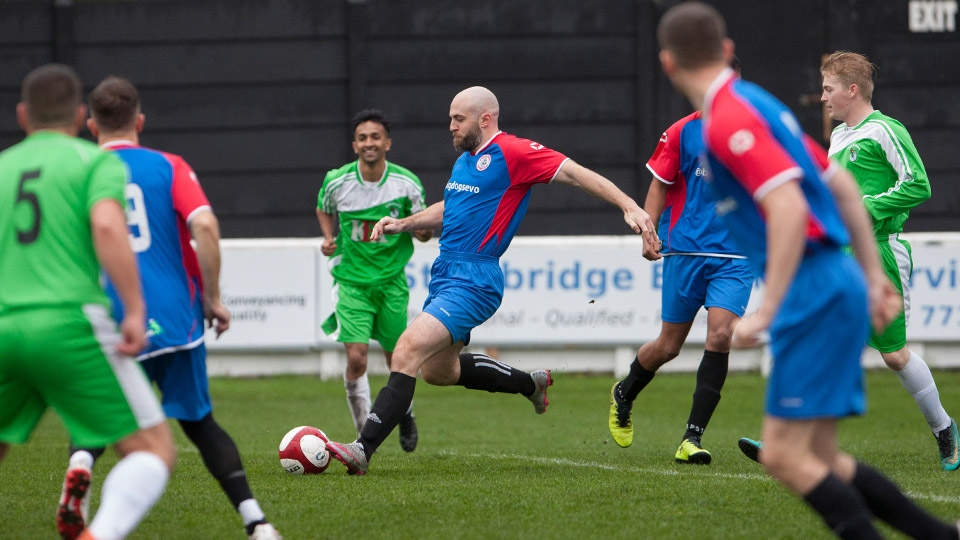 Players compete in last year's Emmaus Mossley vs GMP charity match