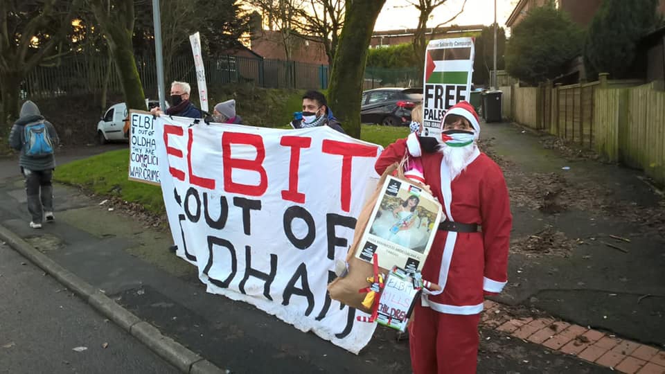 Protesters gathered outside the factory on Greenacres Road, Waterhead