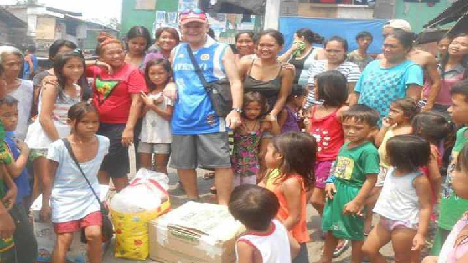 John Flanagan is pictured in the Philippines