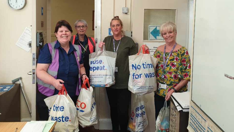 Rose Knipe is pictured with her kind-hearted Tesco colleagues