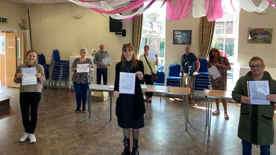 MP Angela Rayner is pictured with volunteers