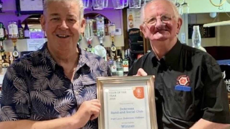 John Holden (right) is pictured with CAMRA’s Peter Alexander at an earlier award win ceremony