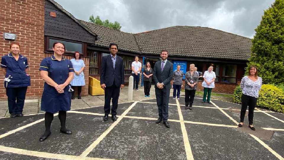 MP Jim McMahon is pictured with staff at Chadderton’s Butler Green House