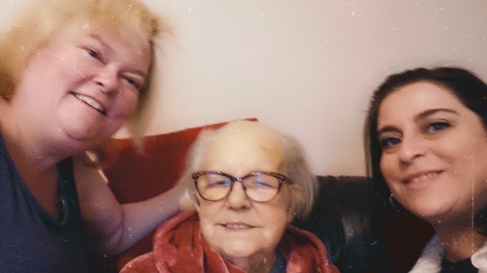 Shelia is pictured (centre) flanked by friends Jenni Winland and Julie Hardington