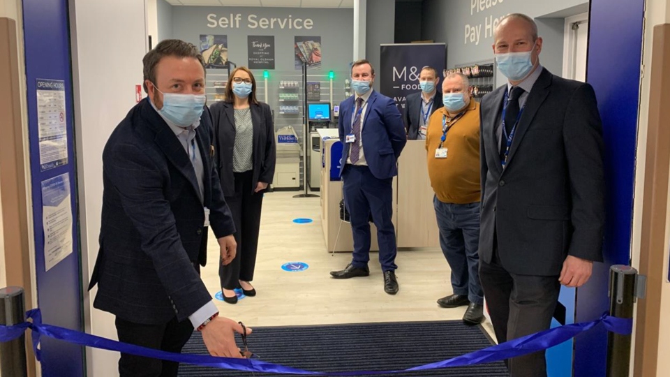 Cutting the ribbon: Rob Jepson, Group Director of Capital, Estates and Facilities for the Northern Care Alliance NHS Group and David Roberts, Senior Business Development Manager, WHSmith