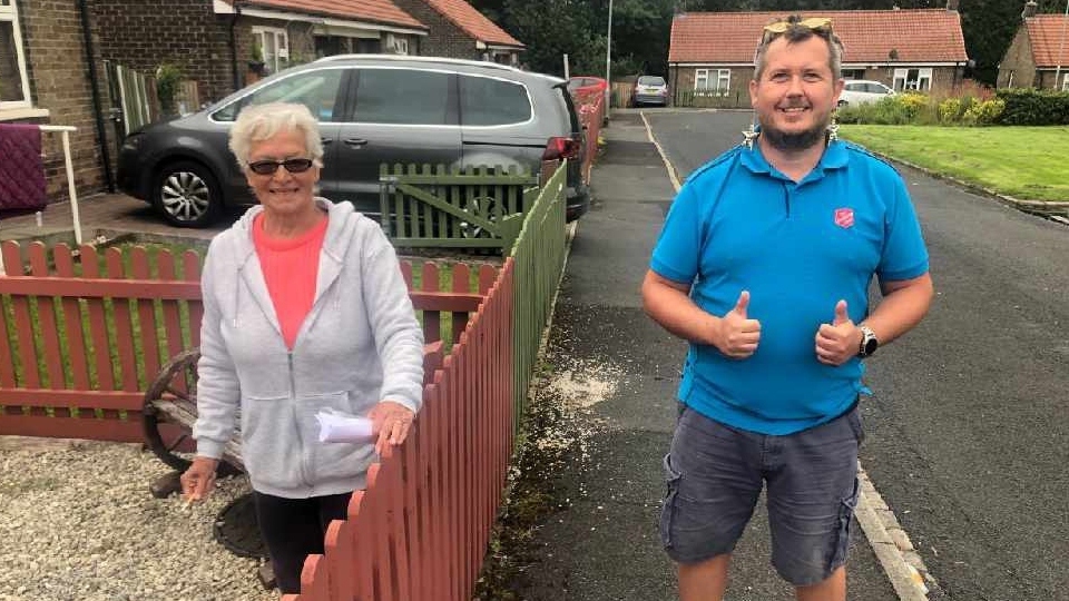 FCHO resident Hilda Moffett (left) with Graham Rogers from the Salvation Army during a community singo bingo session