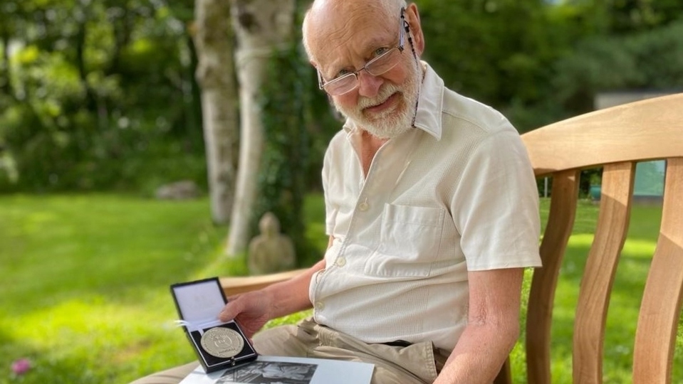 Richard Darlington proudly shows off his Emmaus UK 30th Anniversary Founders’ Medal