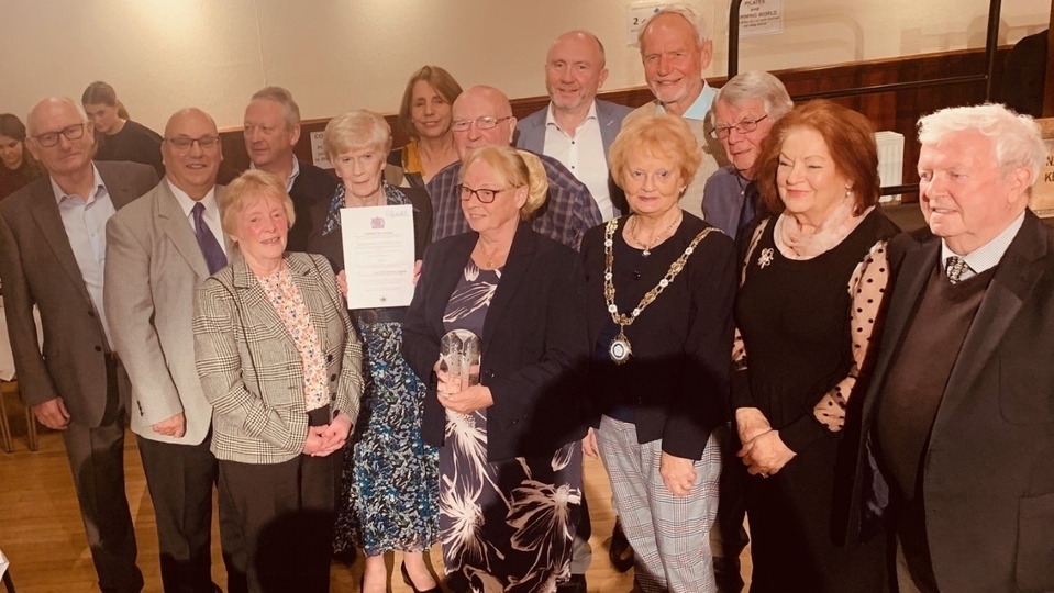 Pictured are representatives of all the Whit Friday Contest Committees along with the Chair of Saddleworth Parish Council, Cllr Barbara Beeley, at the event which was attended by about 150 contests volunteers. Image courtesy of John Battye