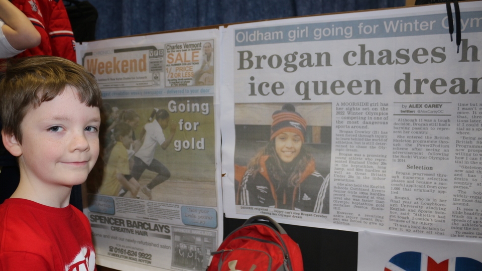 Riley Woolfenden and pictures of Olympic Skeleton competitor Brogan Crowley, decorating Holy Cross School in Oldham. 