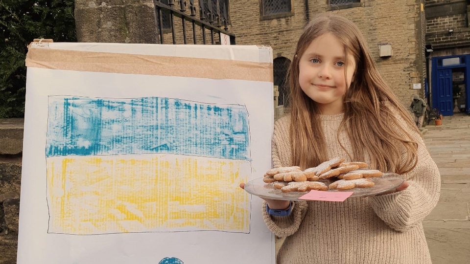 Chloe Bardsley at her bake sale in Dobcross