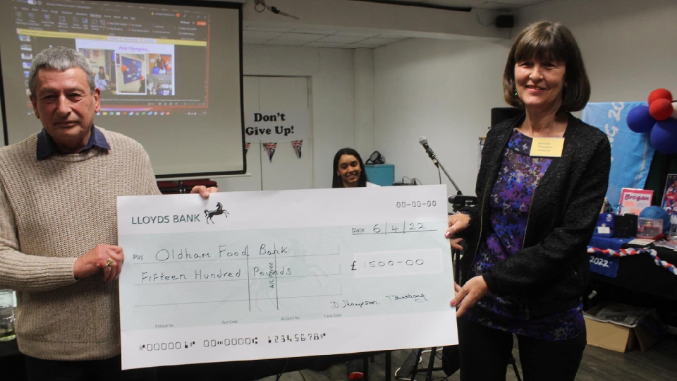 The cheque was presented to volunteers at Oldham Foodbank