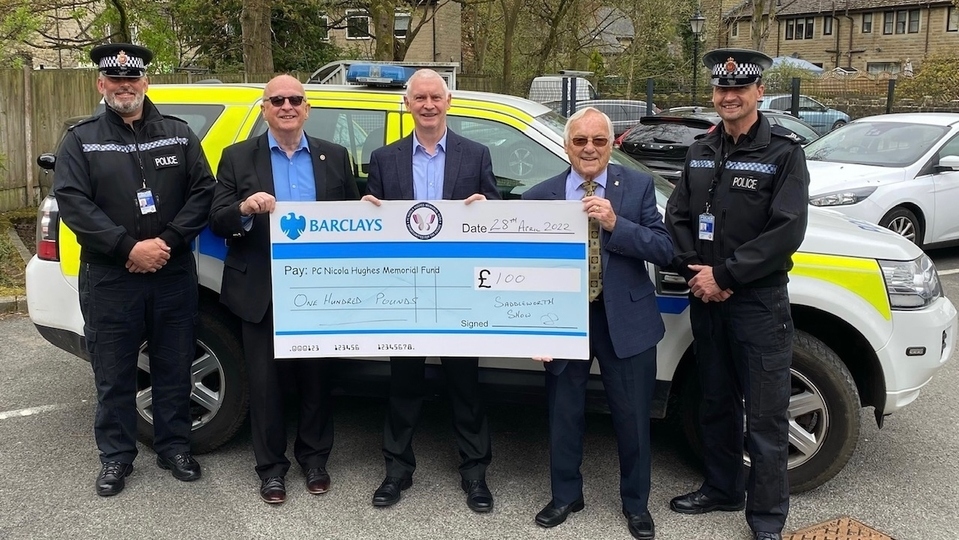 Pictured, left to right, PC Jonny Marsden GMP; Frank Bolger, Saddleworth Show and Wellifest committee and Oldham Metro Rotary; Bryn Hughes; Lawrence Perrins Saddleworth Show and Wellifest committee and Saddleworth Rotary; Sergeant Paul Heap, GMP