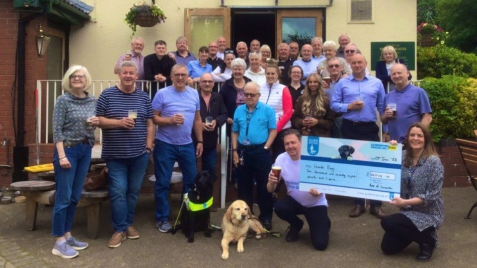 The £10,000 cheque presentation for the Name the Puppy, Change a Life appeal at the Rose of Lancaster