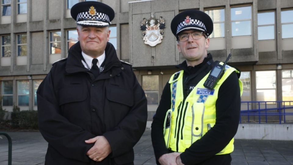 GMP Chief Constable Stephen Watson is pictured with Oldham Chief Superintendent Chris Bowen outside the Oldham Police station yesterday