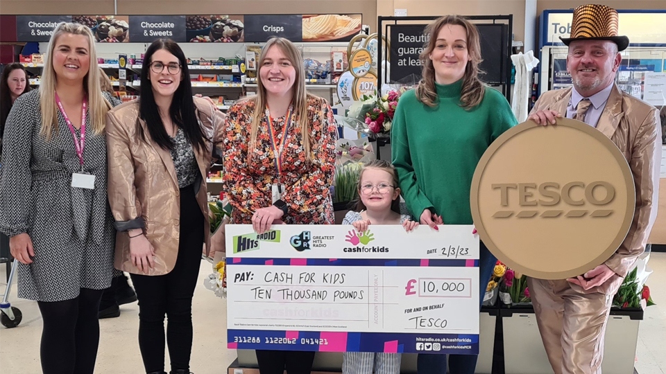 The cheque was presented at the Tesco store in Greenfield