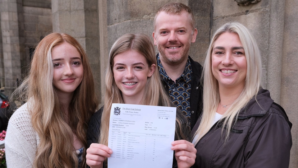 Kathryn Richmond, who gained 10 grade 9’s and one grade 8, celebrating with her family