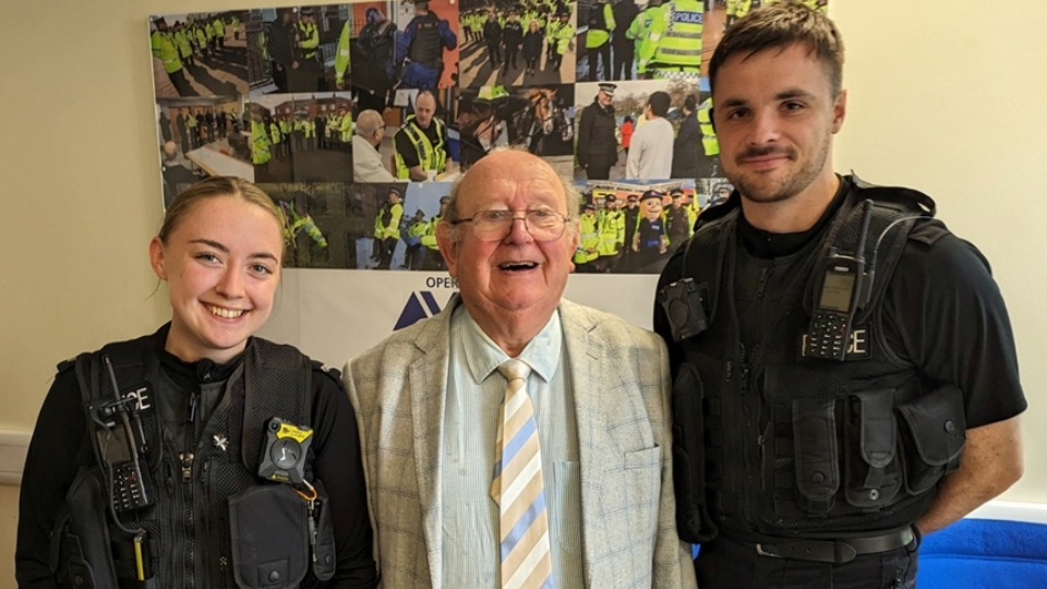 PC Holt, Mr Barton and PC Bennett are pictured at Oldham Police Station