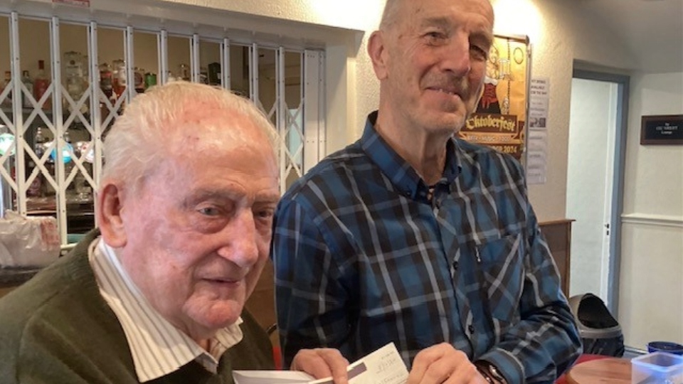 Clint Elliott, president of Saddleworth Rotary Club (right) presents a cheque to Dr Eamonn O’Daly