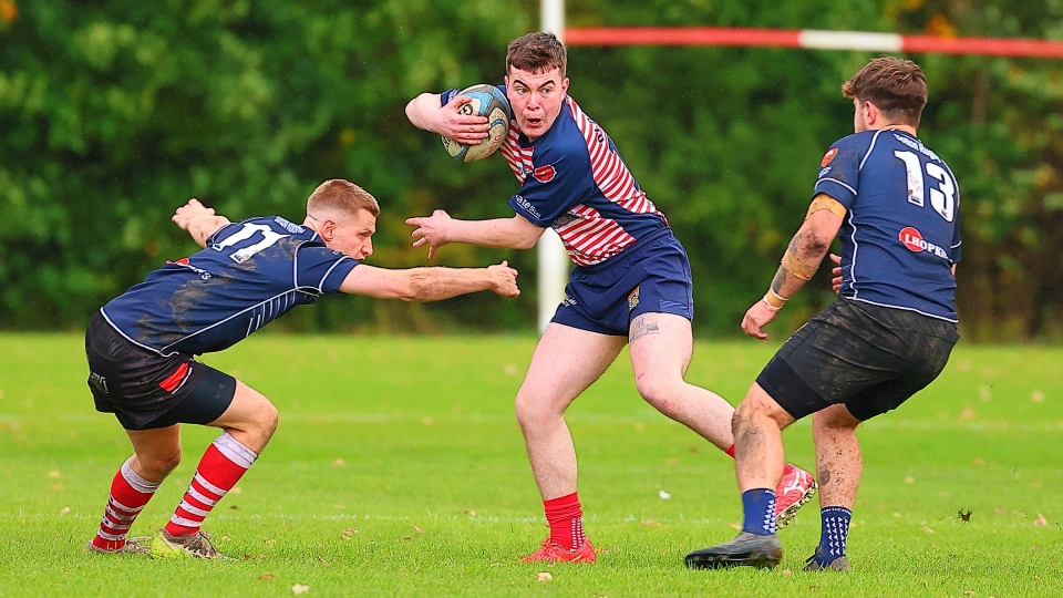 Oldham's Lewis Ward in the thick of the action