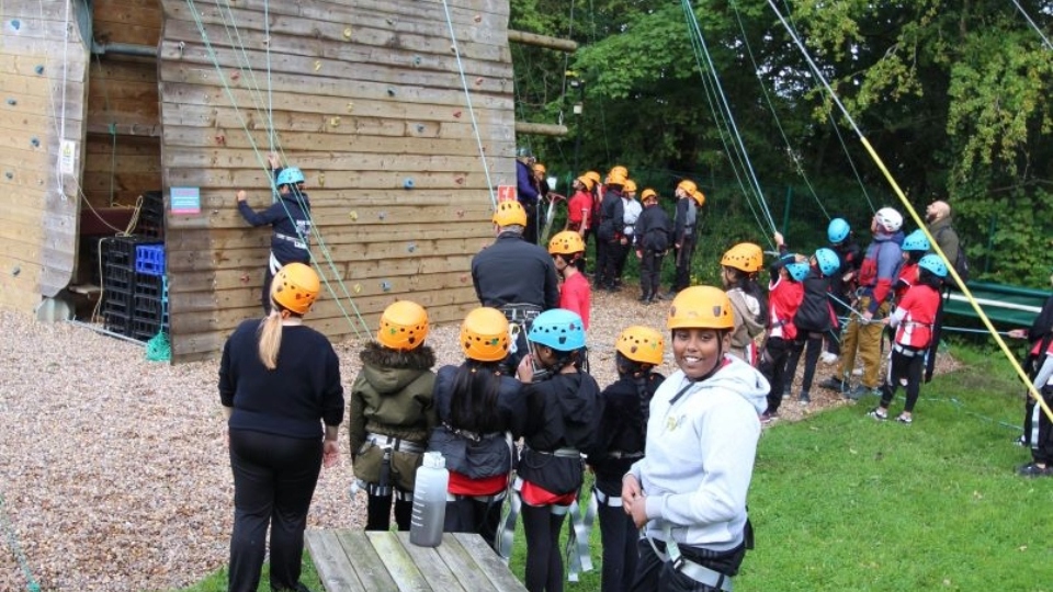 Scaling the heights - students scale the abseiling tower amongst many other activities