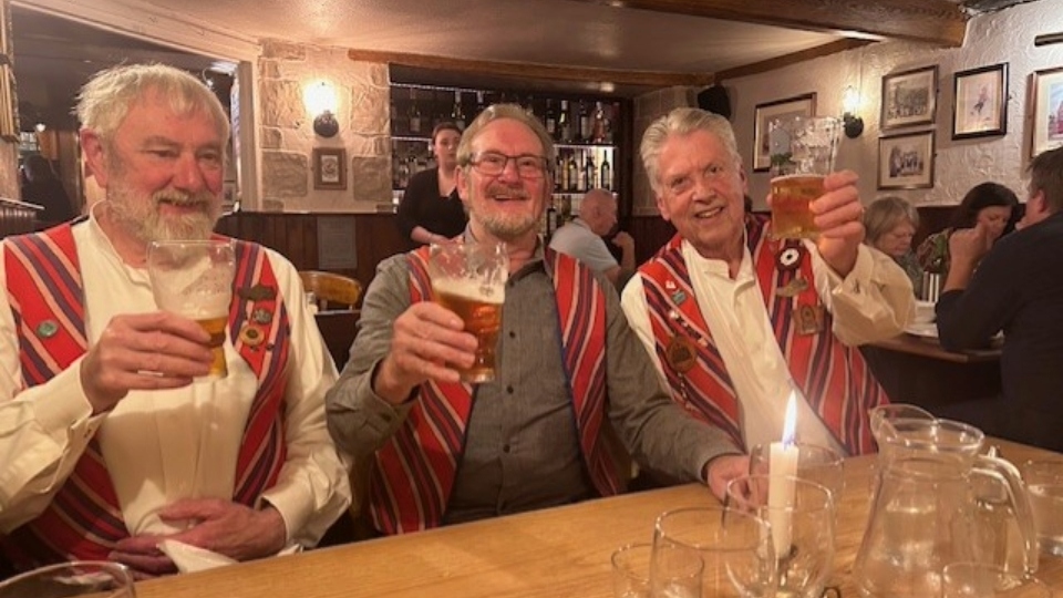 Raising a glass: John Dunning, Ron Yates and Peter Ashworth