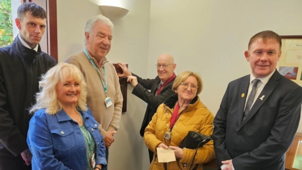 Councillor Chris Goodwin (right) was joined at the unveiling of the the postbox by the Deputy Mayor of Oldham, Cllr Eddie Moores (rear), Deputy Mayoress Kath Moores, Councillors Sandra Ball and Mark Wilkinson and funeral director Michael Lindup