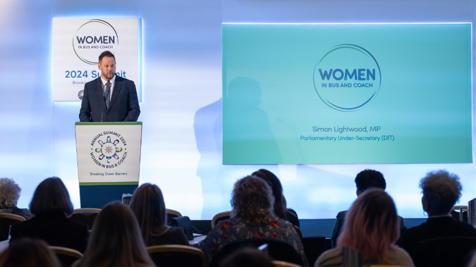 Local Transport Minister Simon Lightwood speaks at the Women In Bus and Coach conference. Image courtesy of the Department for Transport