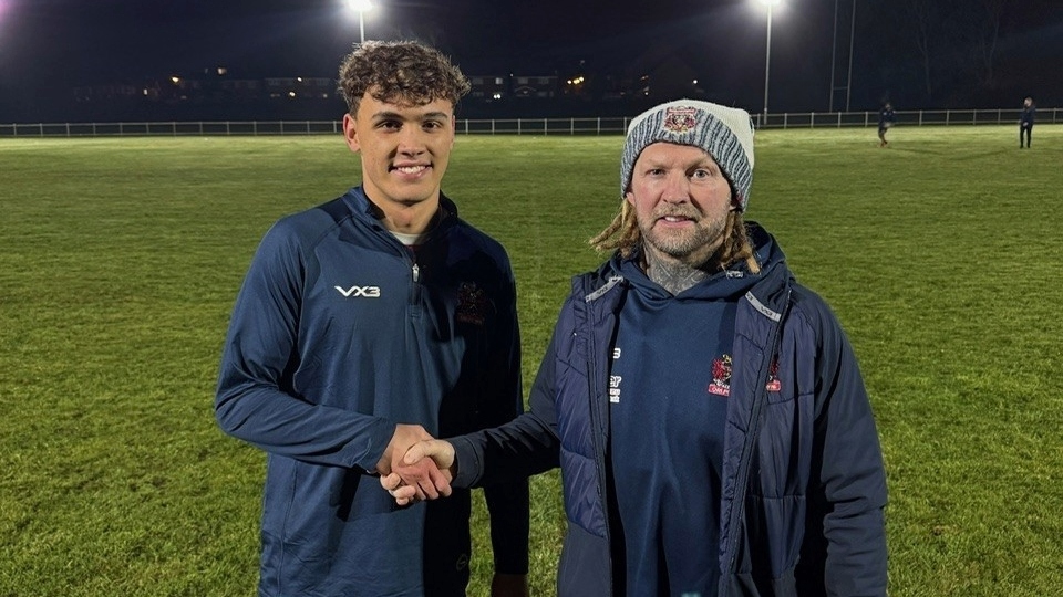 Oldham's Marcus Geener is pictured with head coach Sean Long