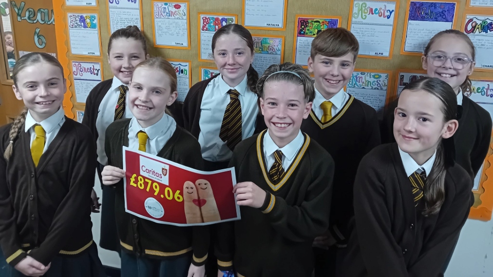 The class, led by their dedicated teacher Mrs Cath Knowles, raised an incredible £879.06 for two local causes close to their hearts - Dr. Kershaw's Hospice in Royton and The Diocese of Salford's Caritas Charity